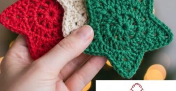 Three hand-crocheted star-shaped coasters in red, cream, and green, with a crochet chart displayed beside them.