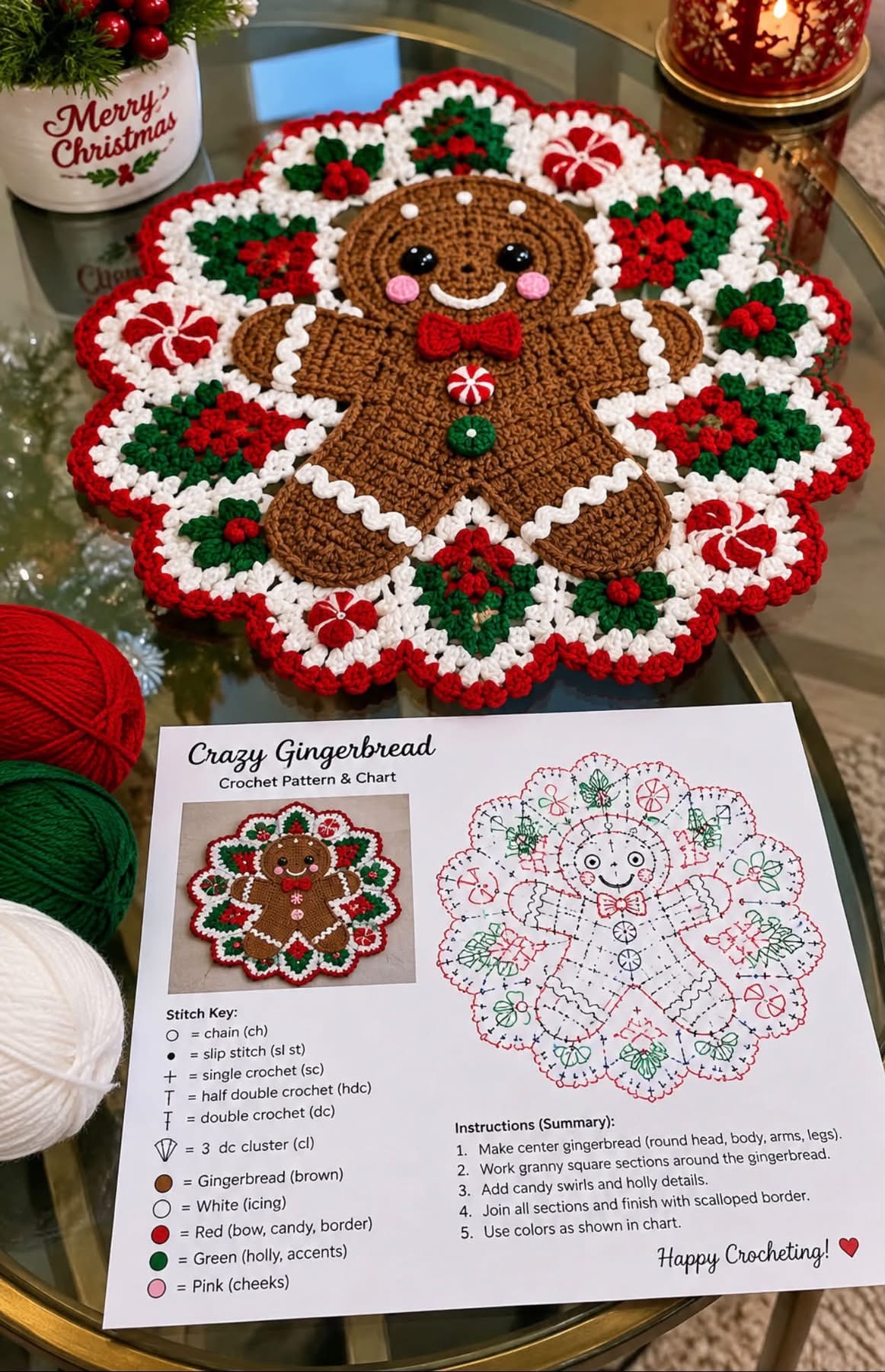 A crocheted gingerbread man doily centerpiece with scalloped holiday border, candy motifs, and holly leaves in red, white, green, and brown yarn.