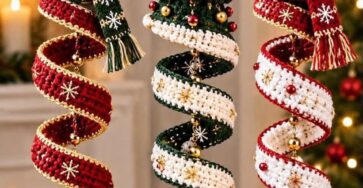 Three crochet spiral Christmas ornaments with Santa, a Christmas tree, and a snowman, each decorated with festive colors, scarves, and gold baubles.