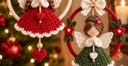 Two crocheted angel Christmas ornaments, one in red and one in green, hanging inside circular hoops and decorated with flowers, bows, and hearts.