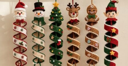A set of crocheted spiral hanging Christmas ornaments inspired by Santa, snowman, tree, reindeer, gingerbread, and elf with whimsical, festive details.