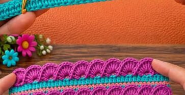 A crocheted rectangular panel with repeating shell stitch stripes in bright purple, aqua, and peach yarn.