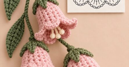 Three crocheted pink bell flowers with green leaves and stems, along with a crochet diagram for the flower shape.