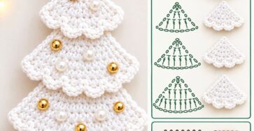 A crocheted white Christmas tree ornament with a yellow star topper, four scalloped tree layers, gold and pearl beads, and a brown trunk.